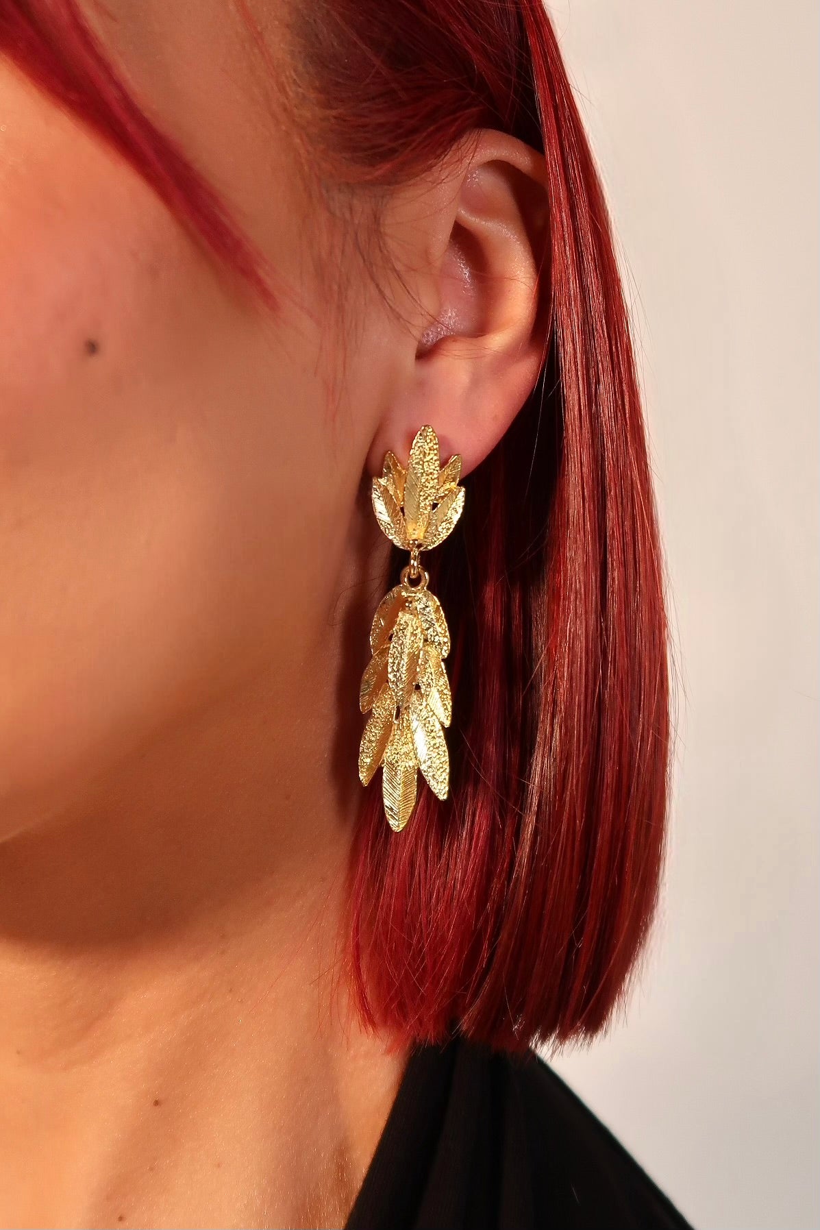 The Dangle Feathers Gold Earrings
